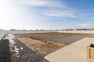 View of fenced backyard