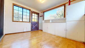 Mud room with entrance near the workshop.