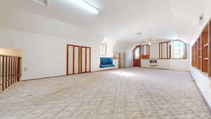 Level 2 bonus room with window seat and storage.