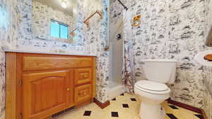 Bath attached to main bedroom on level 1.