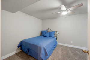 Bedroom with carpet and ceiling fan
