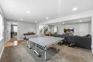 Playroom featuring carpet, recessed lighting, and an office area