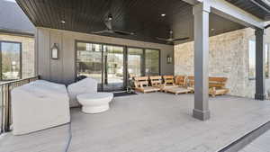 View of patio / terrace with an outdoor living space and a ceiling fan