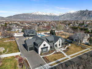 Aerial view of residential area with a mountain backdrop