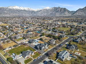 View of property location featuring a mountainous background and nearby suburban area