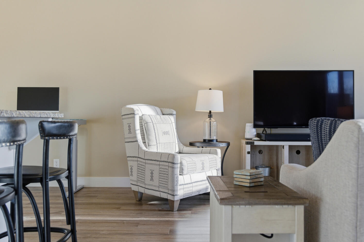 Office space with baseboards and wood finished floors