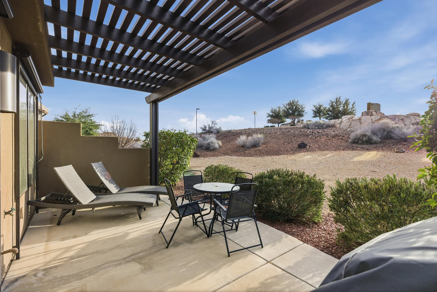 View of patio / terrace featuring a pergola and outdoor dining area