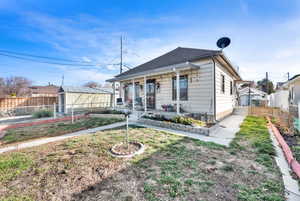 View of front of house with covered porch