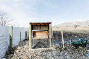 Exterior space featuring an outdoor structure and a mountain view