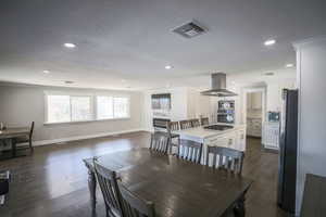 Great room and fireplace view. Windows face south.