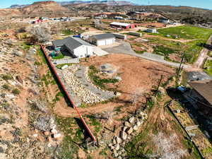 Aerial view of residential area featuring a mountain backdrop