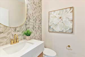 Beautiful half bathroom near the main living room.