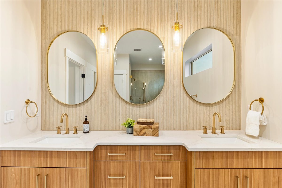 Full bathroom with an over sized shower, free standing tub and double vanity