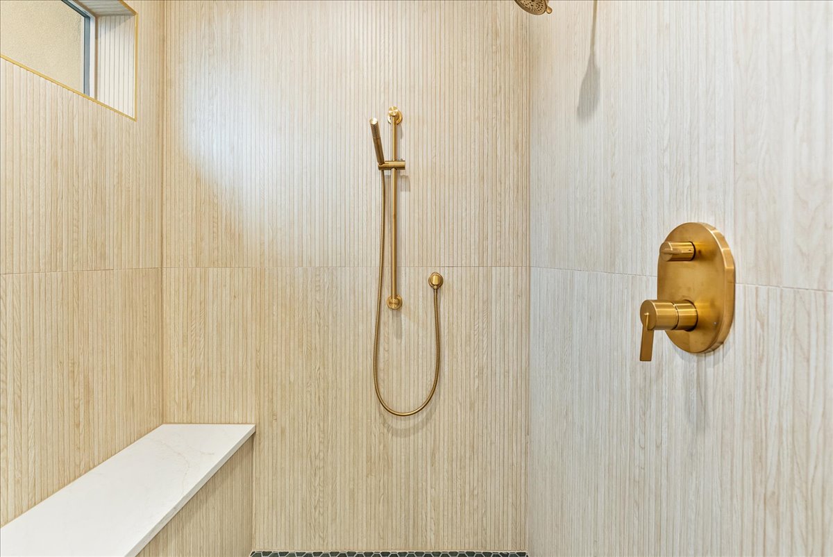 Full bathroom with a tile shower