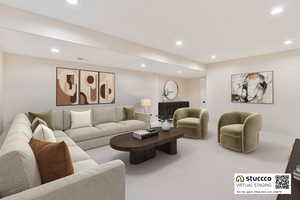 Living room featuring recessed lighting and light carpet - This room is virtually staged.