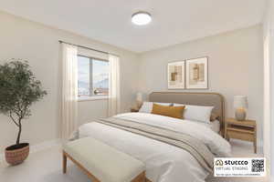 Bedroom #2: Carpeted bedroom on the main floor, with direct access to a full shared bathroom. This room is virtually staged.