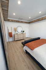 Bedroom featuring wood finished floors and recessed lighting