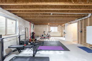 Exercise area featuring concrete flooring