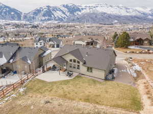 Aerial perspective of suburban area with a mountain backdrop