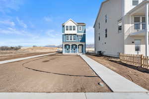 View of front of home with a mountain view