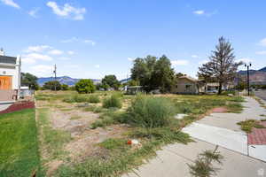 View of yard with a mountain view