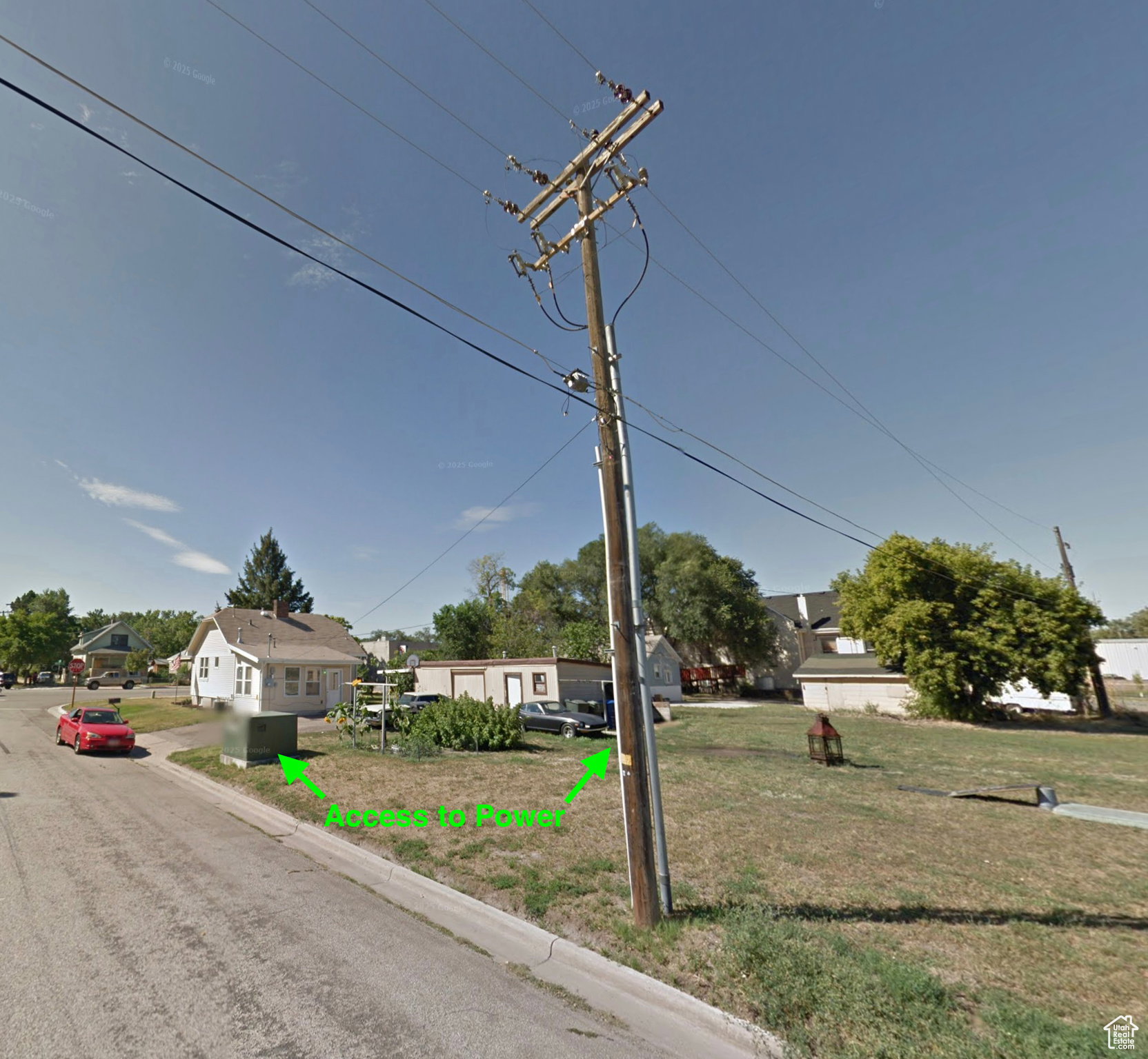 View of front of house with a residential view and a front lawn