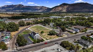 Aerial overview of property's location with a mountainous background