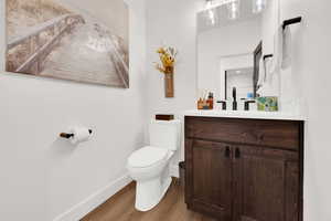 Bathroom featuring vanity and light wood-style flooring