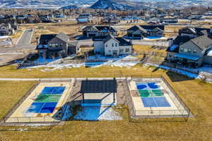 Aerial view of residential area with a mountain backdrop