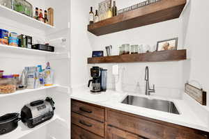 Storage area featuring a sink