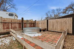 View of fenced backyard