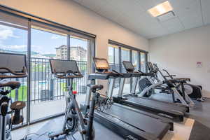 Exercise room featuring a drop ceiling