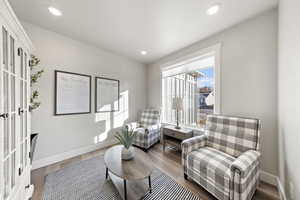 Sitting room featuring wood finished floors and recessed lighting