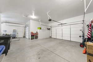 Garage featuring a garage door opener
