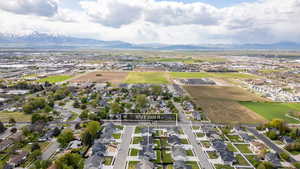 Aerial perspective of suburban area featuring mountains