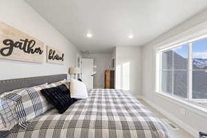 Bedroom with carpet and recessed lighting