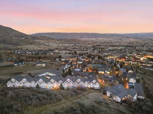 Aerial view at dusk of a residential view and a mountain view
