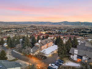 Aerial view of residential area featuring a mountain backdrop