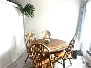 Dining space with an AC wall unit
