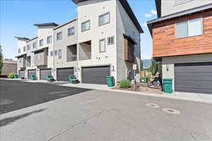 View of property featuring an attached garage