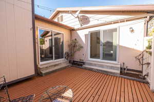 Rear (North) Patio, Left sliding glass to Living Room and Right to Primary Bedroom