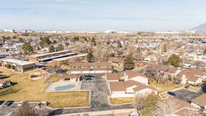 View of property location with nearby suburban area