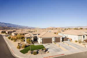 Tile roof rambler featuring a Skyridge community with view of Pine Mountain.