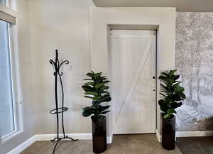 Large barn door off entry to beds 1 and 2.