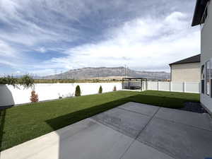 Professionally landscaped yard and fully fenced with 14 x 14 pergola pad with extended patio extension 13 x13.