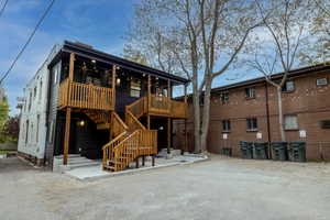 View of back decks, patios and parking lot