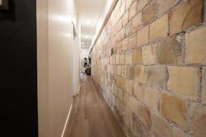 Apt. #4 Hallway with original rock accent wall