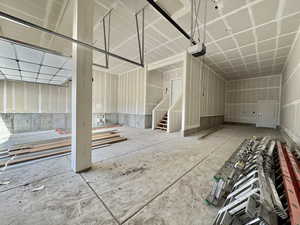 Garage featuring a garage door opener