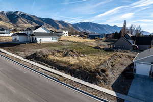 View of mountain background featuring nearby suburban area