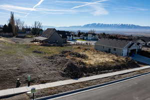 Mountain view featuring nearby suburban area